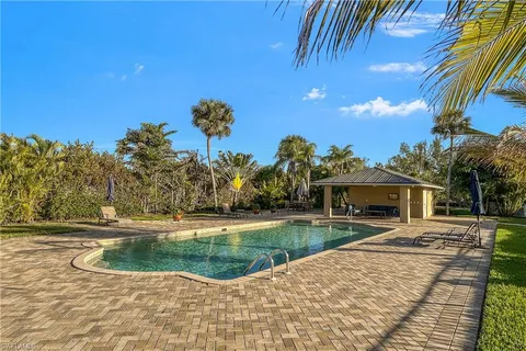 a view of a house with a swimming pool