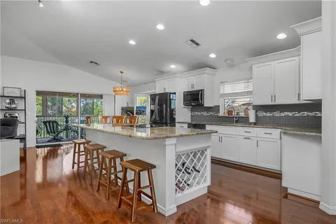 a kitchen with counter space cabinets and appliances