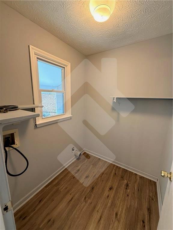 4502 Alder Lane Powder Springs, GA 30127 - Photo 18 of 64 a view of a livingroom with wooden floor and window