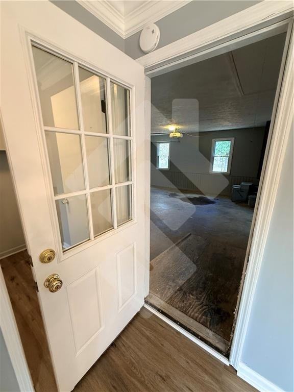 4502 Alder Lane Powder Springs, GA 30127 - Photo 19 of 64 a view of an empty room with wooden floor and a window