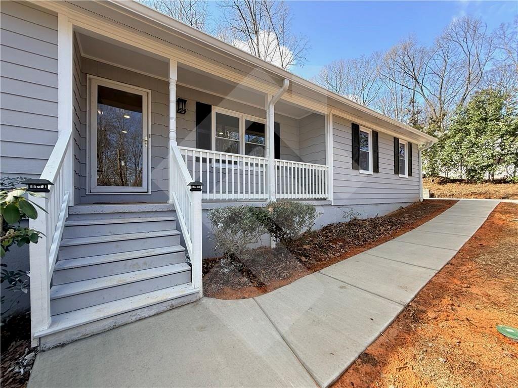 4502 Alder Lane Powder Springs, GA 30127 - Photo 2 of 64 a view of a house with a yard