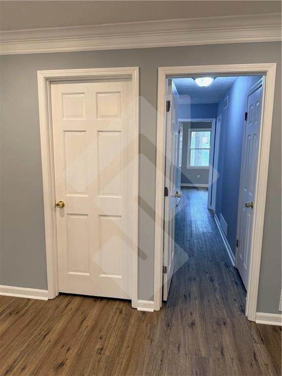 4502 Alder Lane Powder Springs, GA 30127 - Photo 23 of 64 a view of a hallway with wooden floor