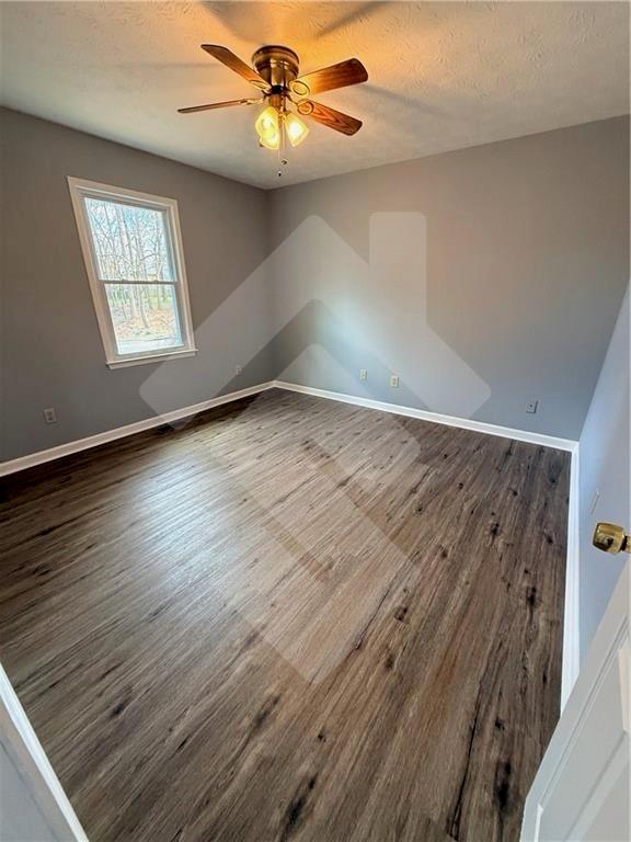 4502 Alder Lane Powder Springs, GA 30127 - Photo 36 of 64 wooden floor in an empty room with a window