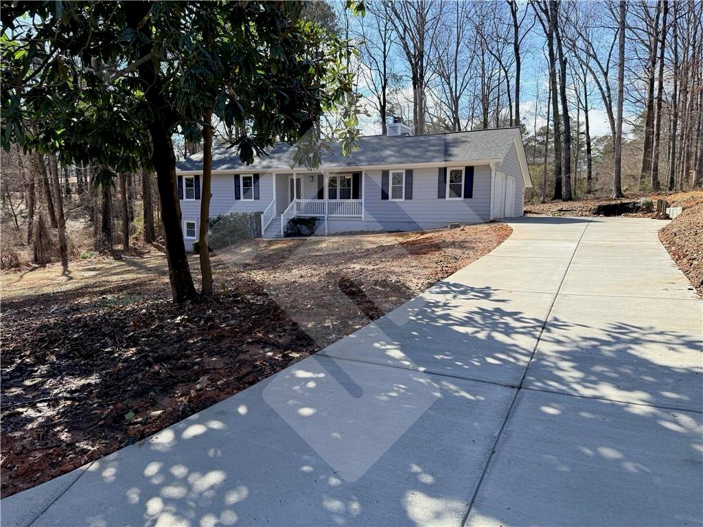 4502 Alder Lane Powder Springs, GA 30127 - Photo 64 of 64 a view of a house with a yard