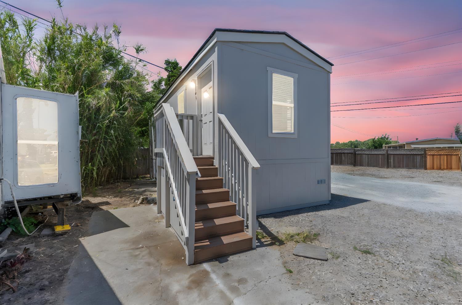 4610 Gateway Road, Unit 13 Bethel Island, CA 94511 - Photo 1 of 17 a view of a house with a yard
