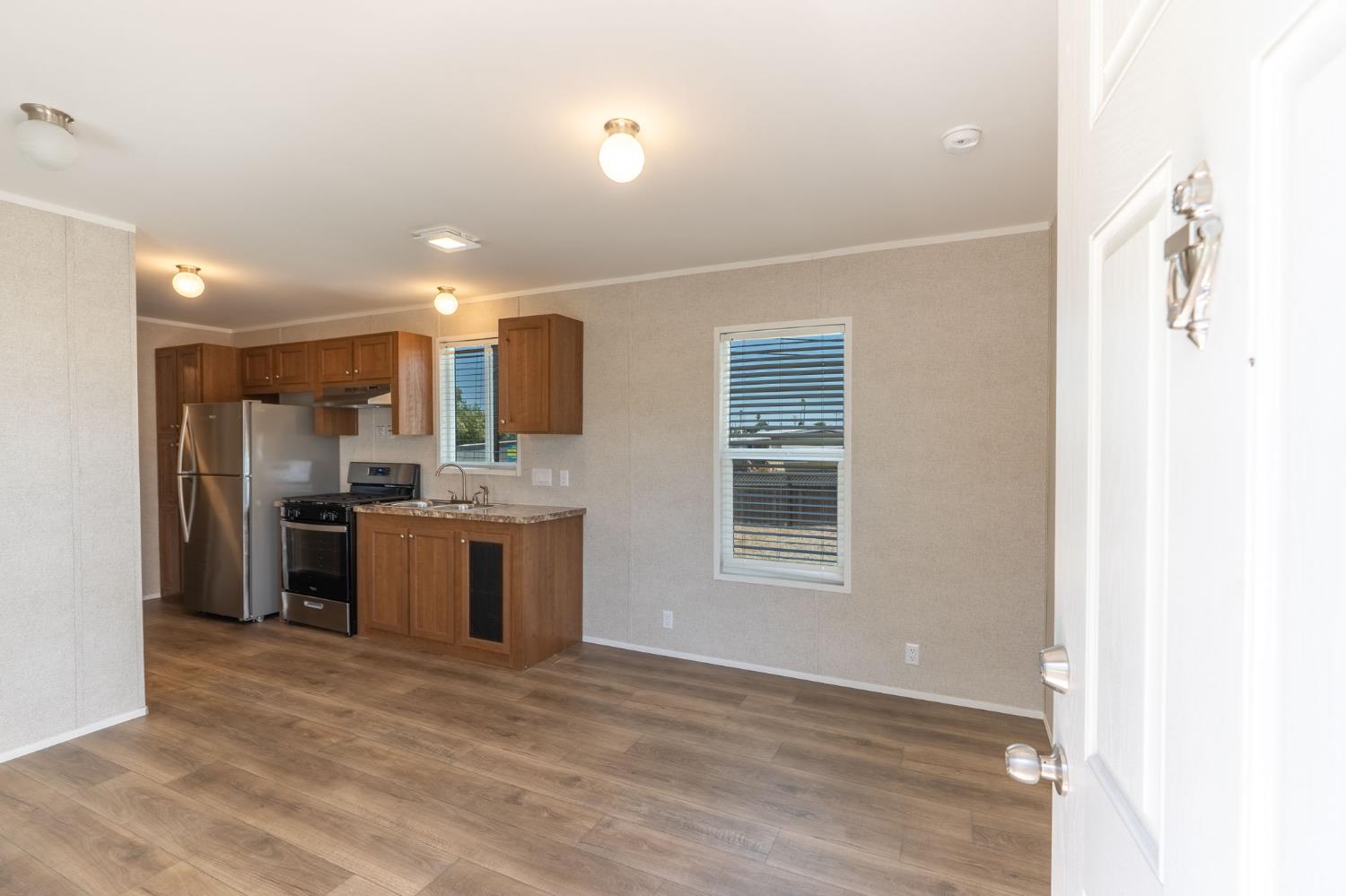 4610 Gateway Road, Unit 13 Bethel Island, CA 94511 - Photo 5 of 17 a view of a kitchen with a sink and a window