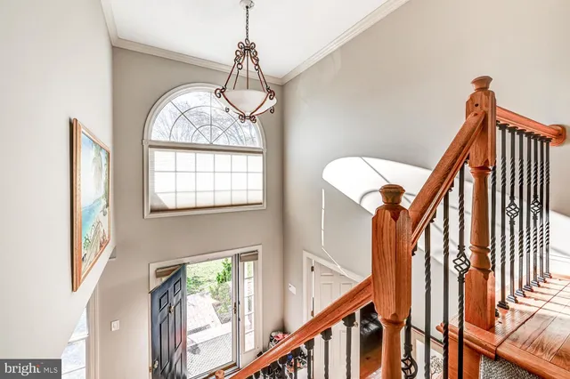 a view of entryway and hall with a window