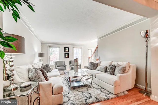 a living room with furniture and a couch
