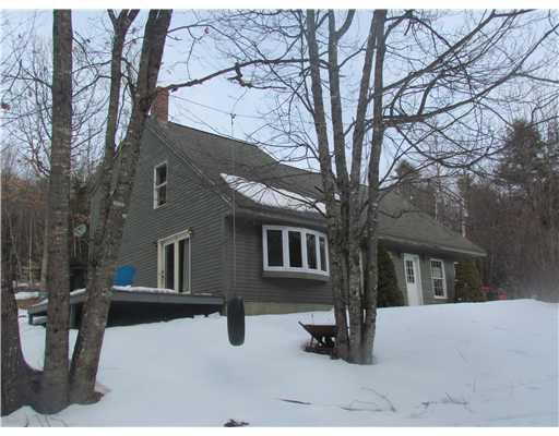 38 Norumbega Road Sebago, ME 04029 - Photo 20 of 25 Exterior Front. Side front view,...