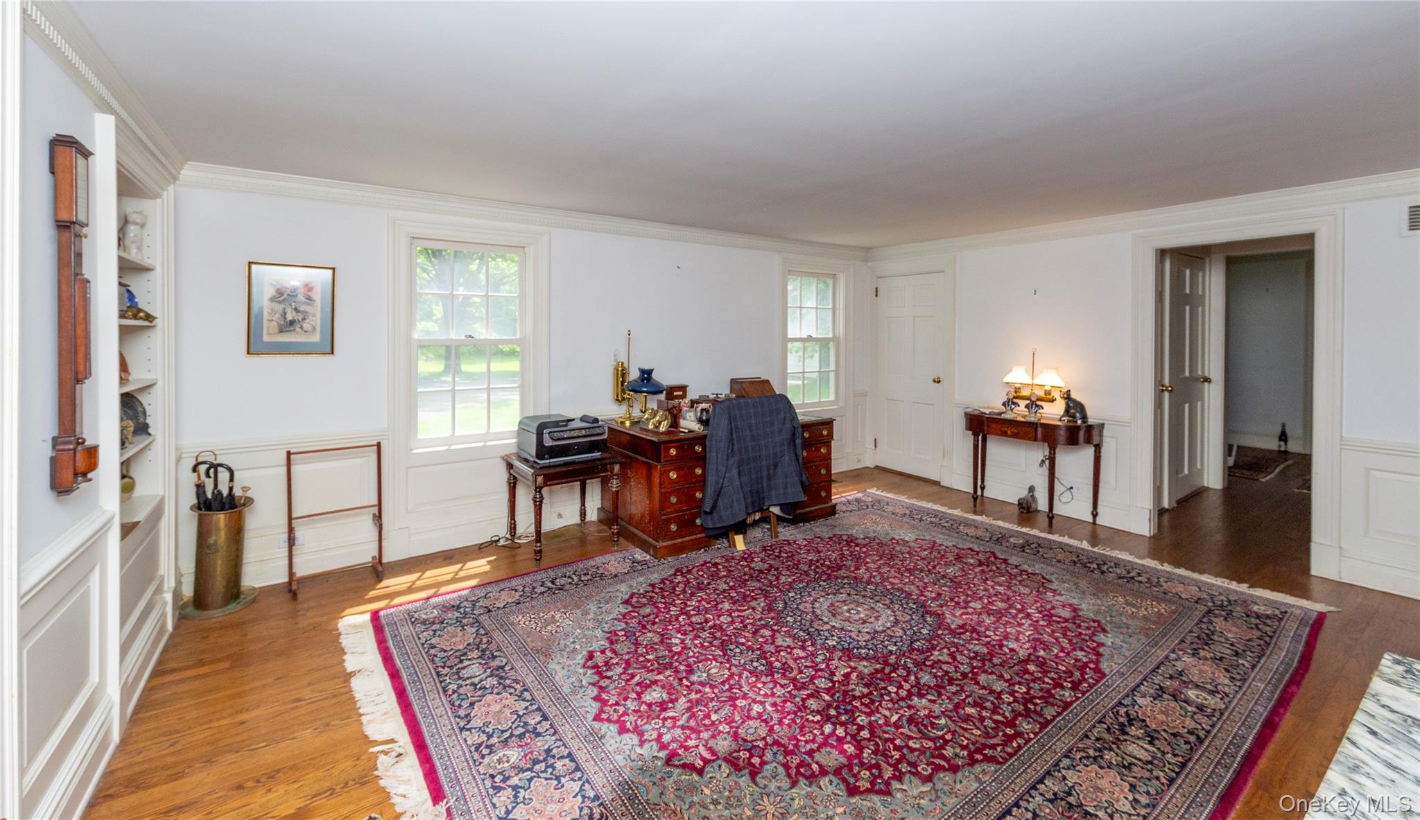 64 South Quaker Hill Road Pawling, NY 12564 - Photo 12 of 41 Spacious interior room featuring hardwood flooring and white paneled walls