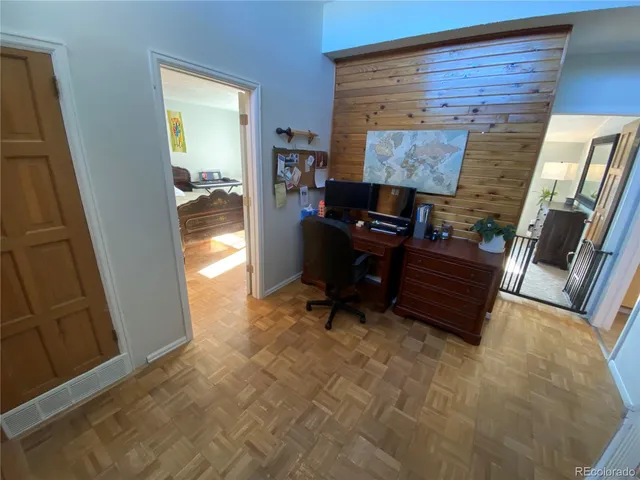 a room with furniture and a gate