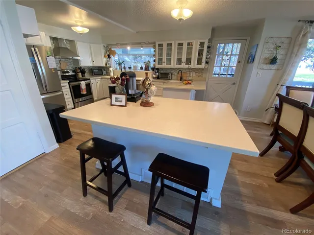 a view of a dining room with furniture