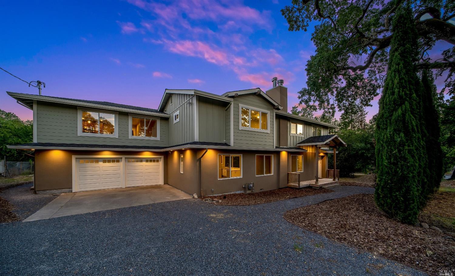 a front view of a house with parking