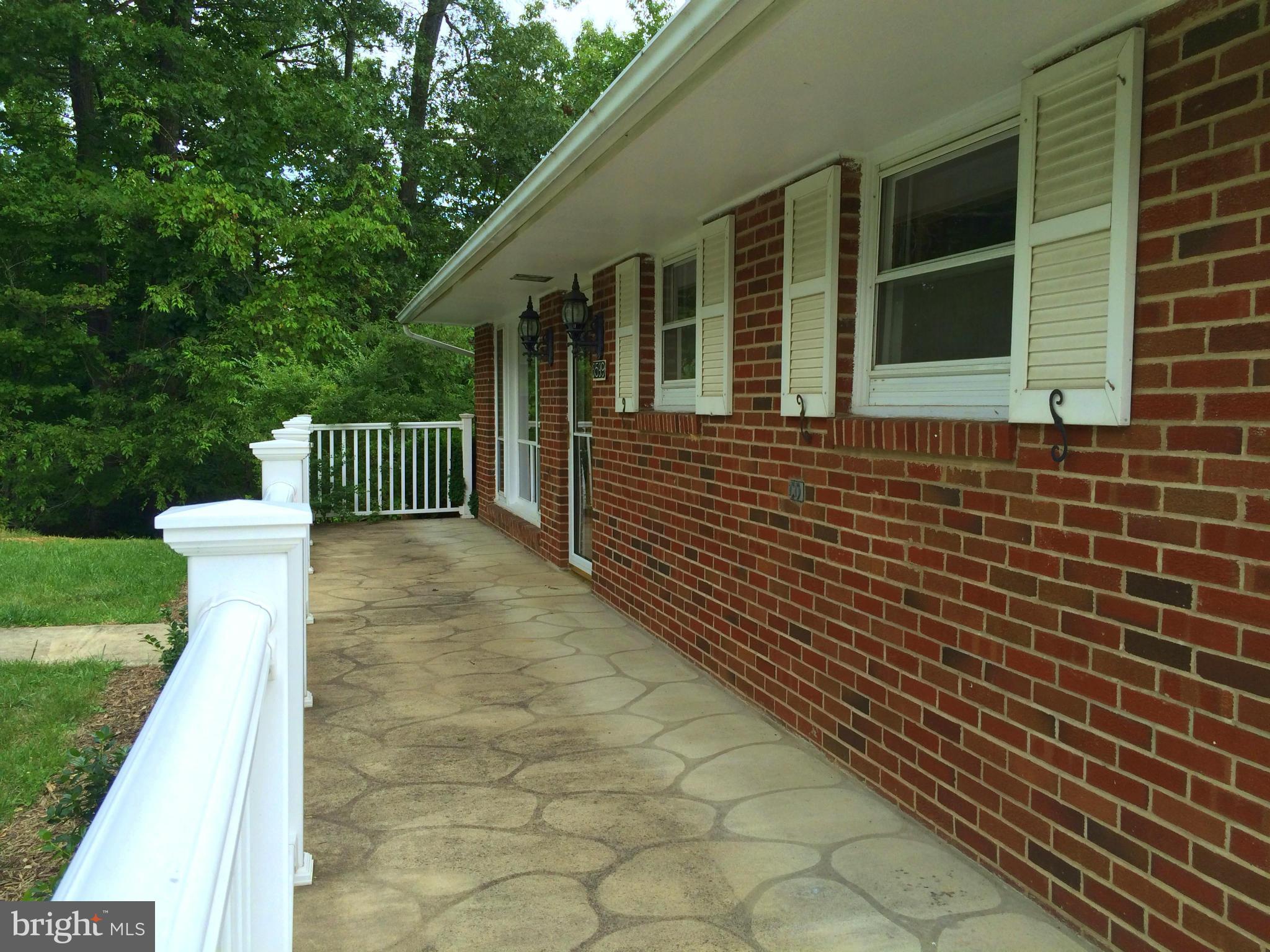 Spacious Front Porch with Front & Side Entrances