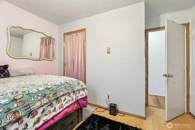 a bathroom with a sink toilet and mirror