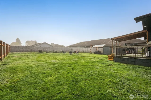 a front view of house with yard and seating area