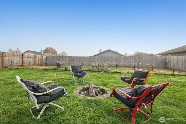 a view of a backyard with plants
