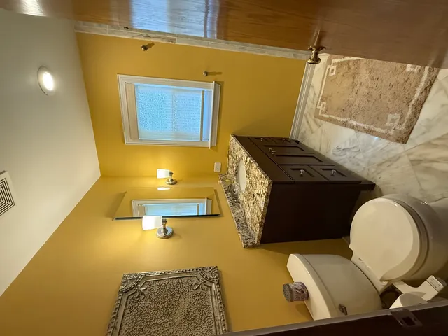 a bathroom with a shower and a sink