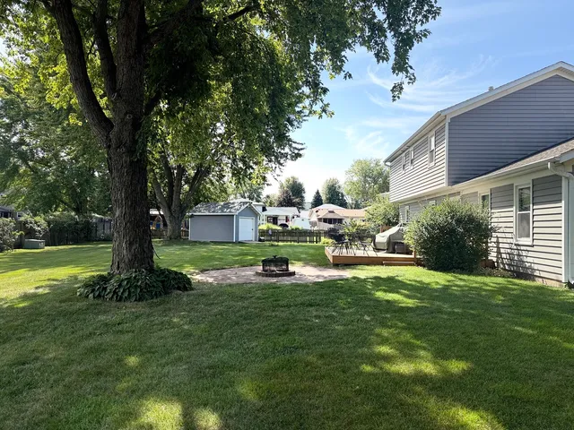 a view of a lake with a big yard