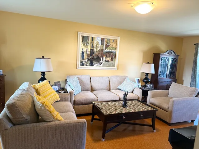 a living room with furniture and a couch