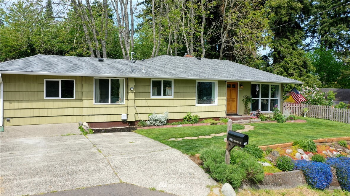 3604 Madrona Street Bremerton, WA 98312 - Photo 2 of 37 a front view of a house with a yard