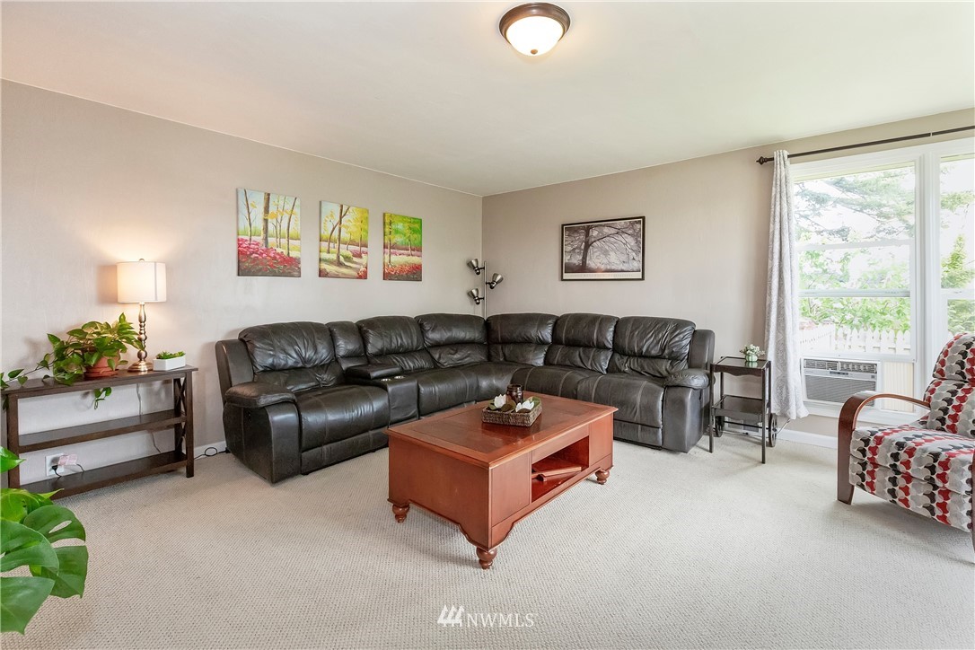 3604 Madrona Street Bremerton, WA 98312 - Photo 3 of 37 a living room with furniture and a large window