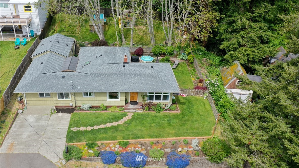 3604 Madrona Street Bremerton, WA 98312 - Photo 23 of 37 an aerial view of a house with a yard basket ball court and outdoor seating