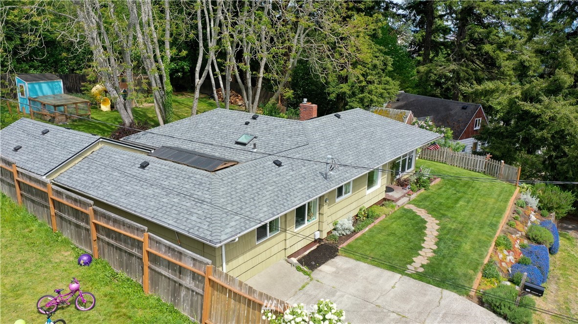 3604 Madrona Street Bremerton, WA 98312 - Photo 25 of 37 an aerial view of a house with a yard