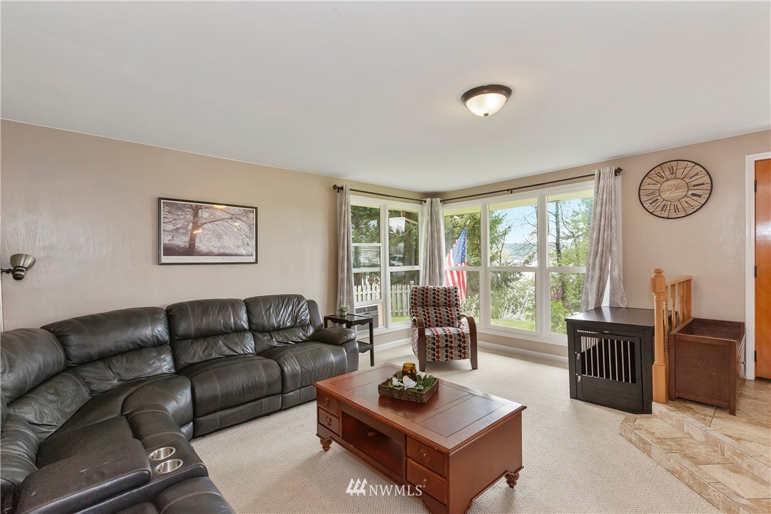 3604 Madrona Street Bremerton, WA 98312 - Photo 4 of 37 a living room with furniture a table and a large window