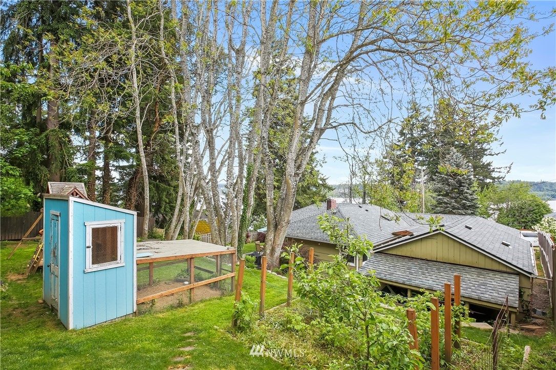 3604 Madrona Street Bremerton, WA 98312 - Photo 31 of 37 a view of house with a yard