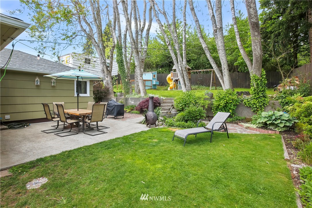 3604 Madrona Street Bremerton, WA 98312 - Photo 36 of 37 a view of a house with backyard porch and sitting area