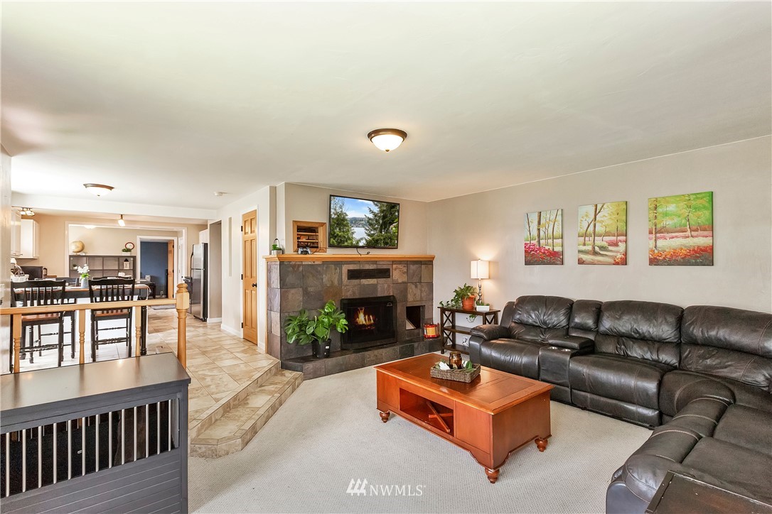 3604 Madrona Street Bremerton, WA 98312 - Photo 6 of 37 a living room with furniture and a fireplace