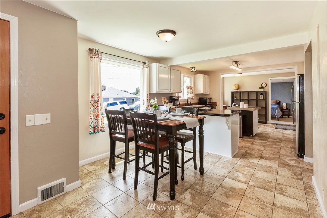 3604 Madrona Street Bremerton, WA 98312 - Photo 7 of 37 a view of a dining area with furniture