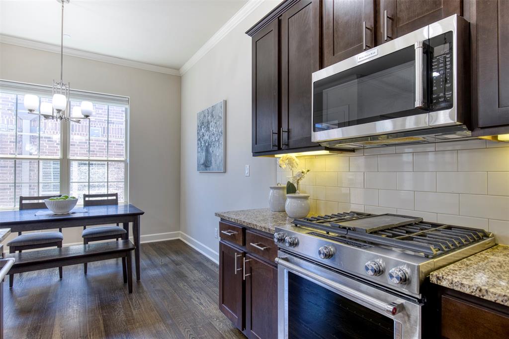 5005 Meridian Lane, Unit 3102 Addison, TX 75001 - Photo 14 of 34 a stove top oven sitting inside of a kitchen