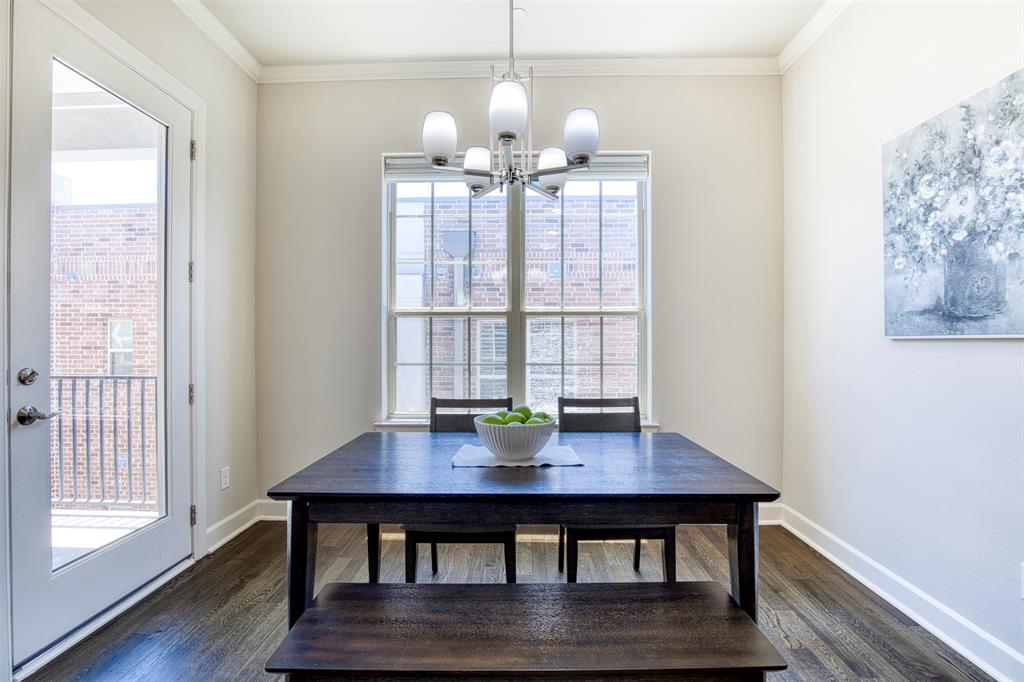 5005 Meridian Lane, Unit 3102 Addison, TX 75001 - Photo 16 of 34 a view of a dining room with furniture and wooden floor