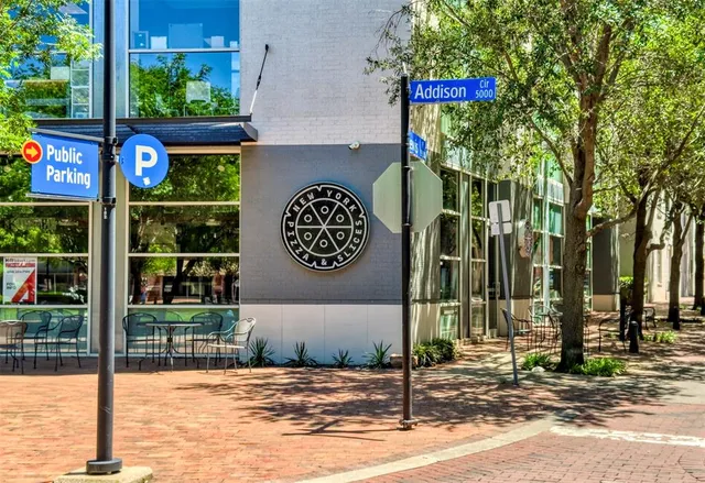 a sign that is on the side of a building