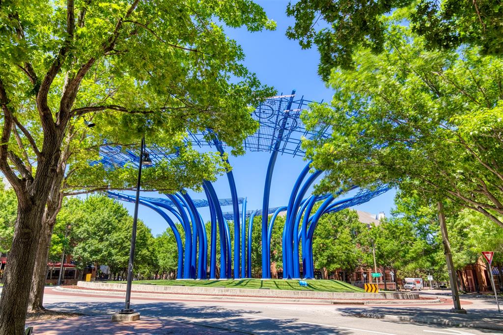 5005 Meridian Lane, Unit 3102 Addison, TX 75001 - Photo 34 of 34 a building view with a yard