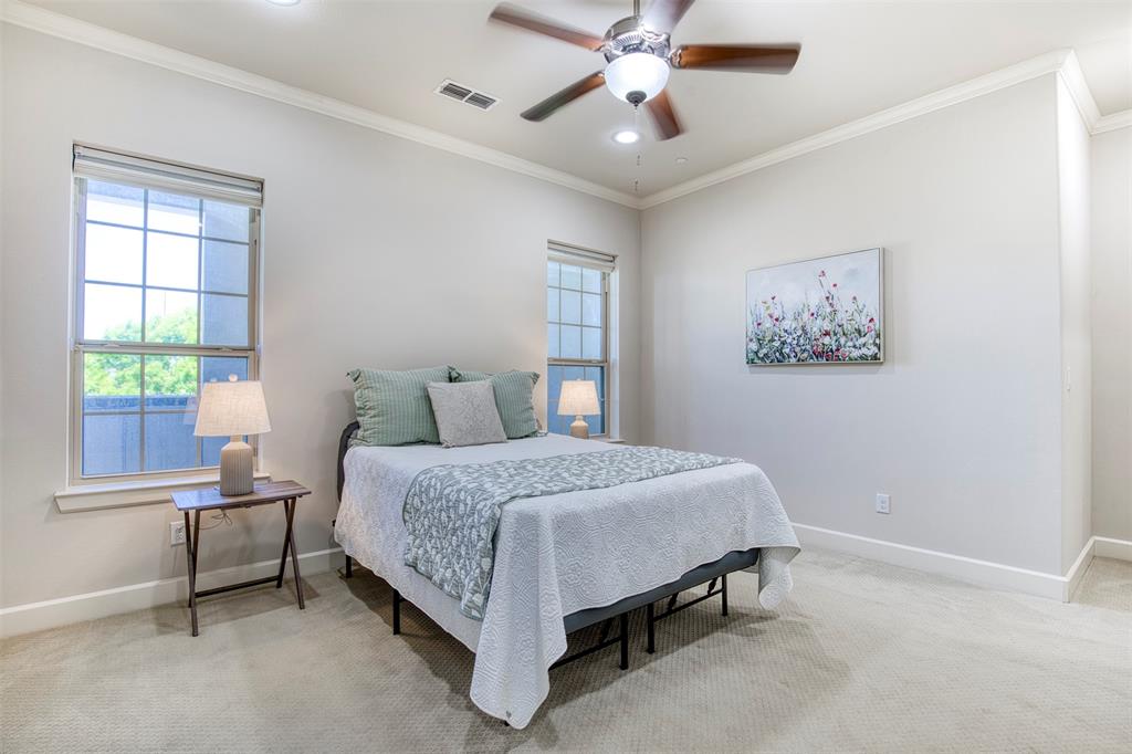 5005 Meridian Lane, Unit 3102 Addison, TX 75001 - Photo 5 of 34 a spacious bedroom with a bed and a window