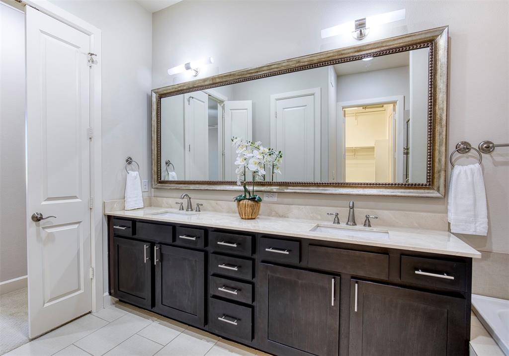 5005 Meridian Lane, Unit 3102 Addison, TX 75001 - Photo 7 of 34 a bathroom with a double vanity sink and a mirror
