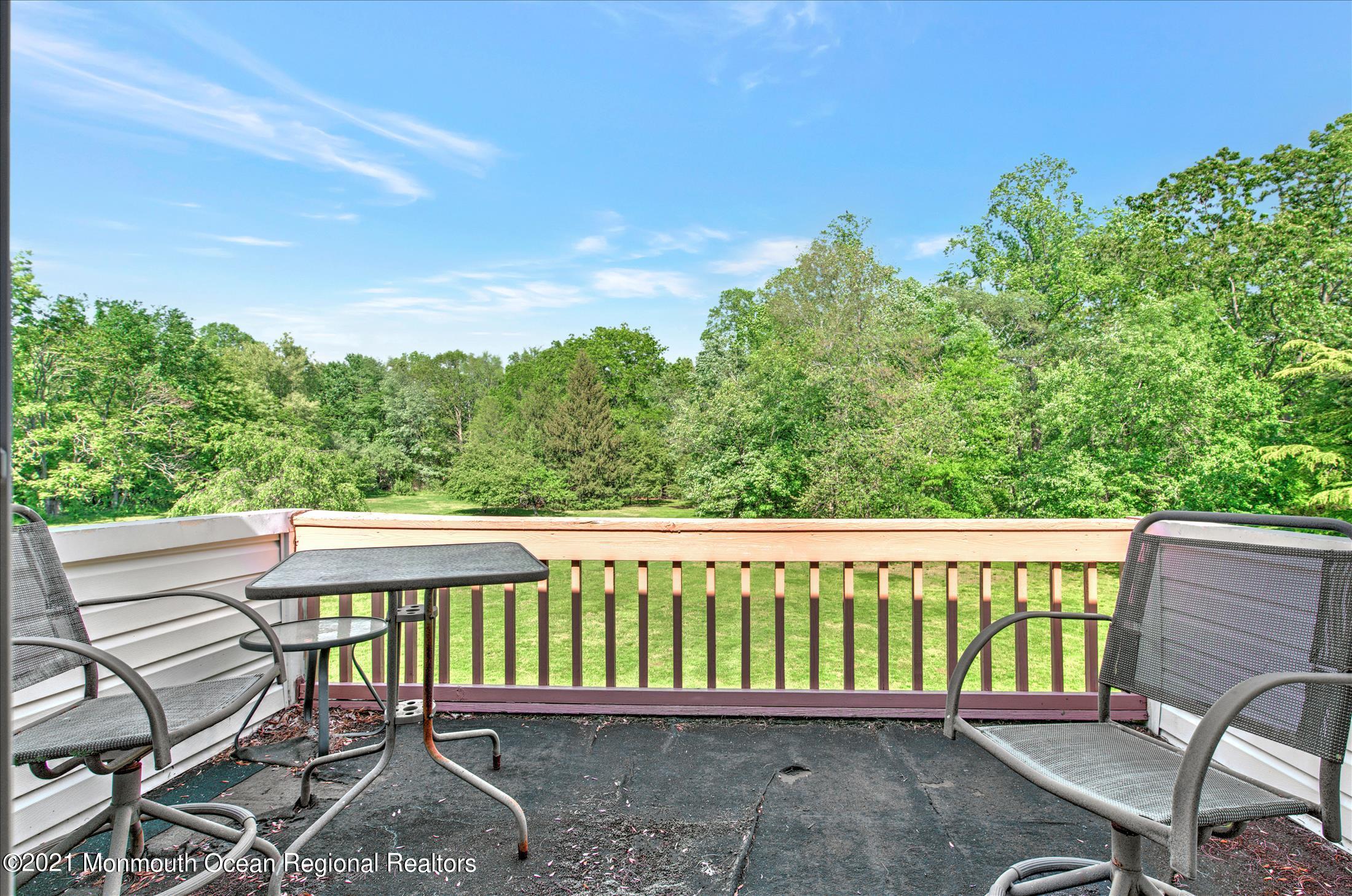 58 Brookside Road Millstone Township, NJ 08510 - Photo 21 of 34 a small garden with tall trees