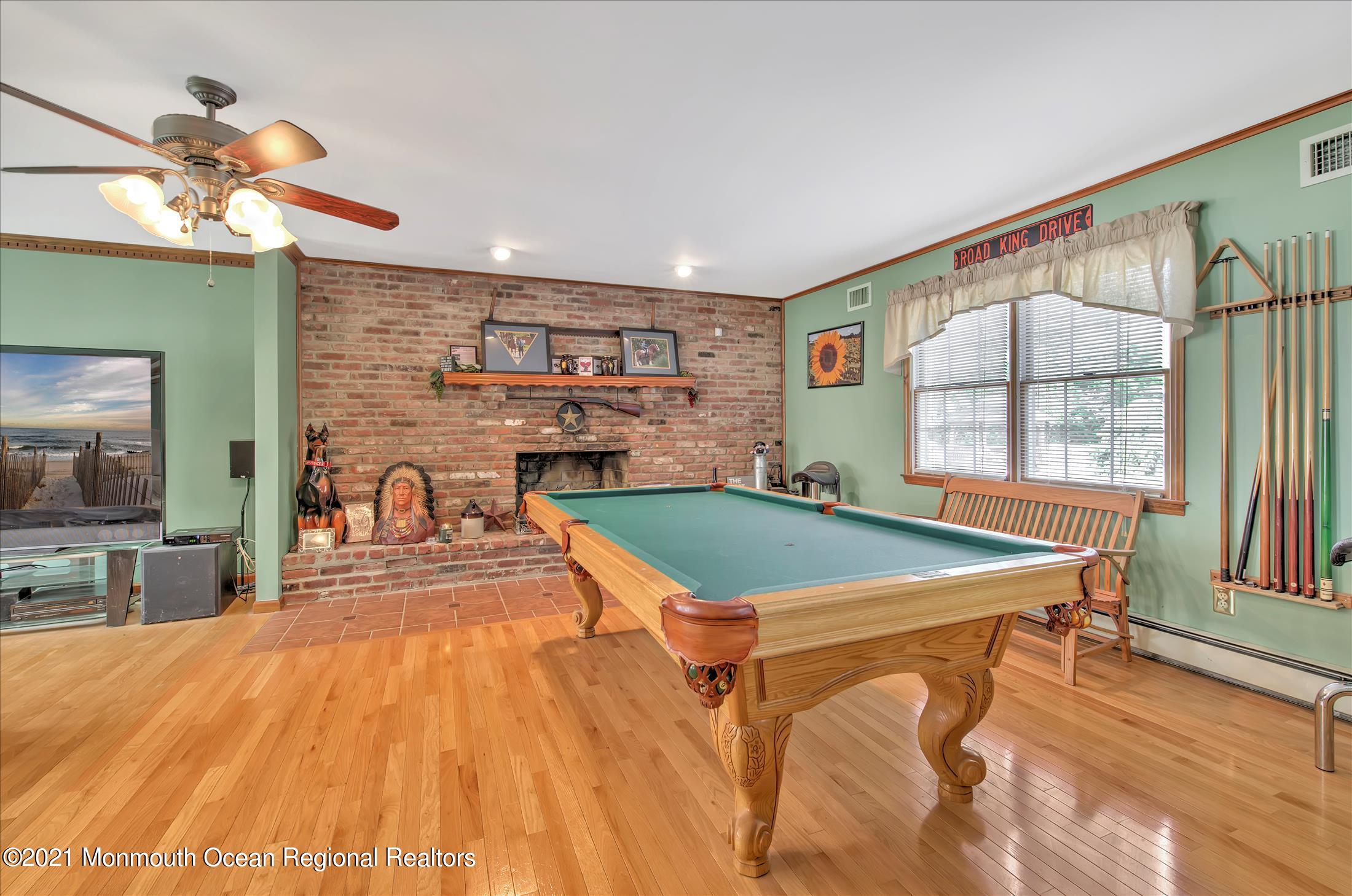 58 Brookside Road Millstone Township, NJ 08510 - Photo 6 of 34 a room with pool table and windows