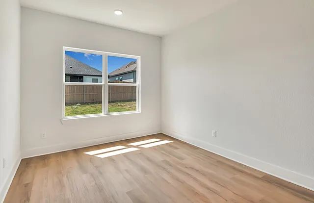 an empty room with a window