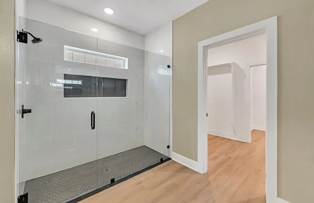 a view of a small space with wooden floor