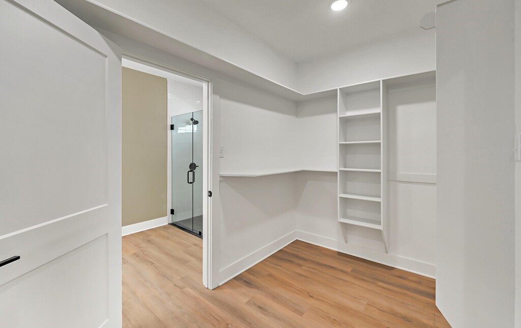 9904 Ridings Drive Waco, TX 76708 - Photo 25 of 37 a view of an empty room with wooden floor and closet