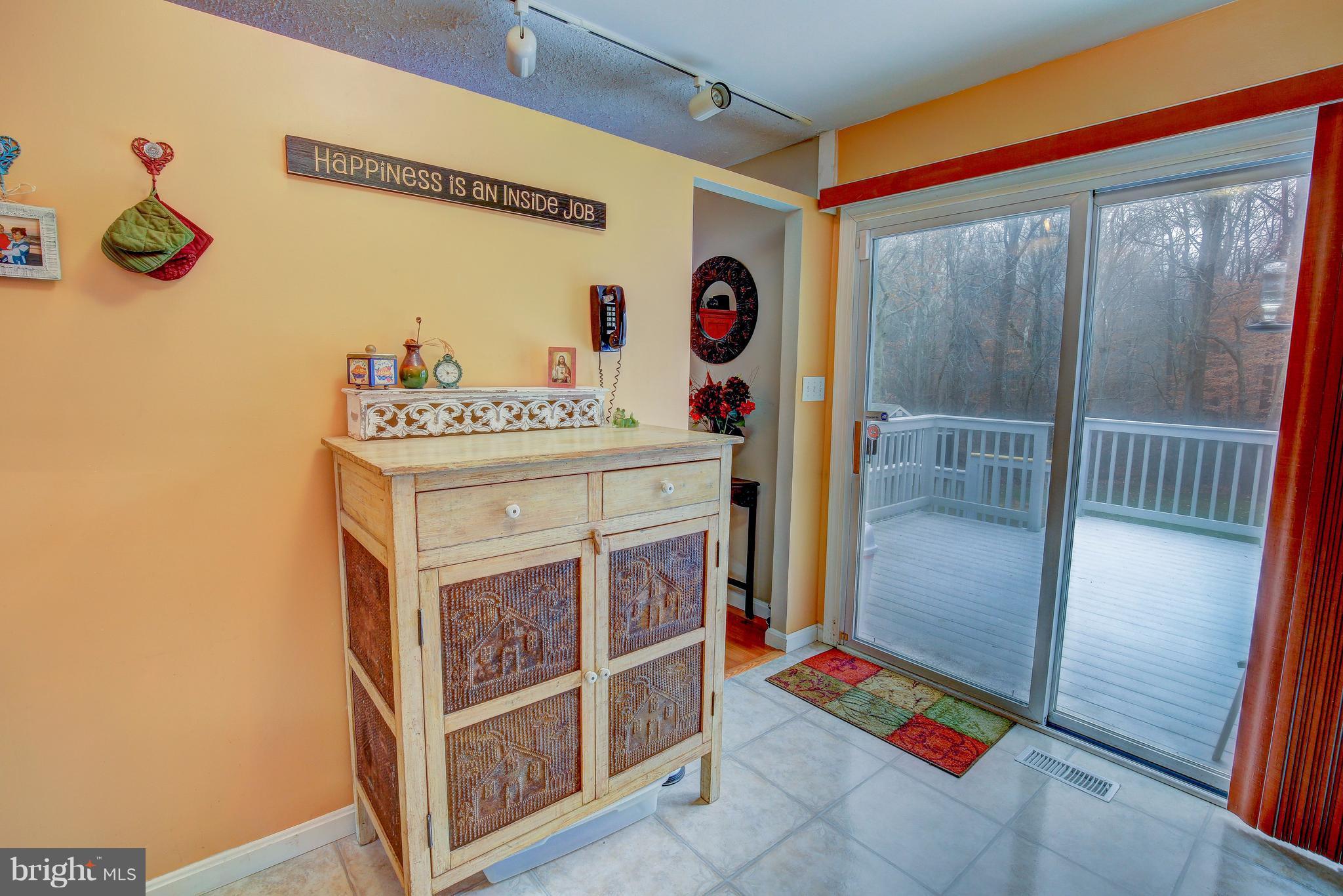 265 Chesapeake Beach Road Owings, MD 20736 - Photo 11 of 30 a utility room with dryer and washer