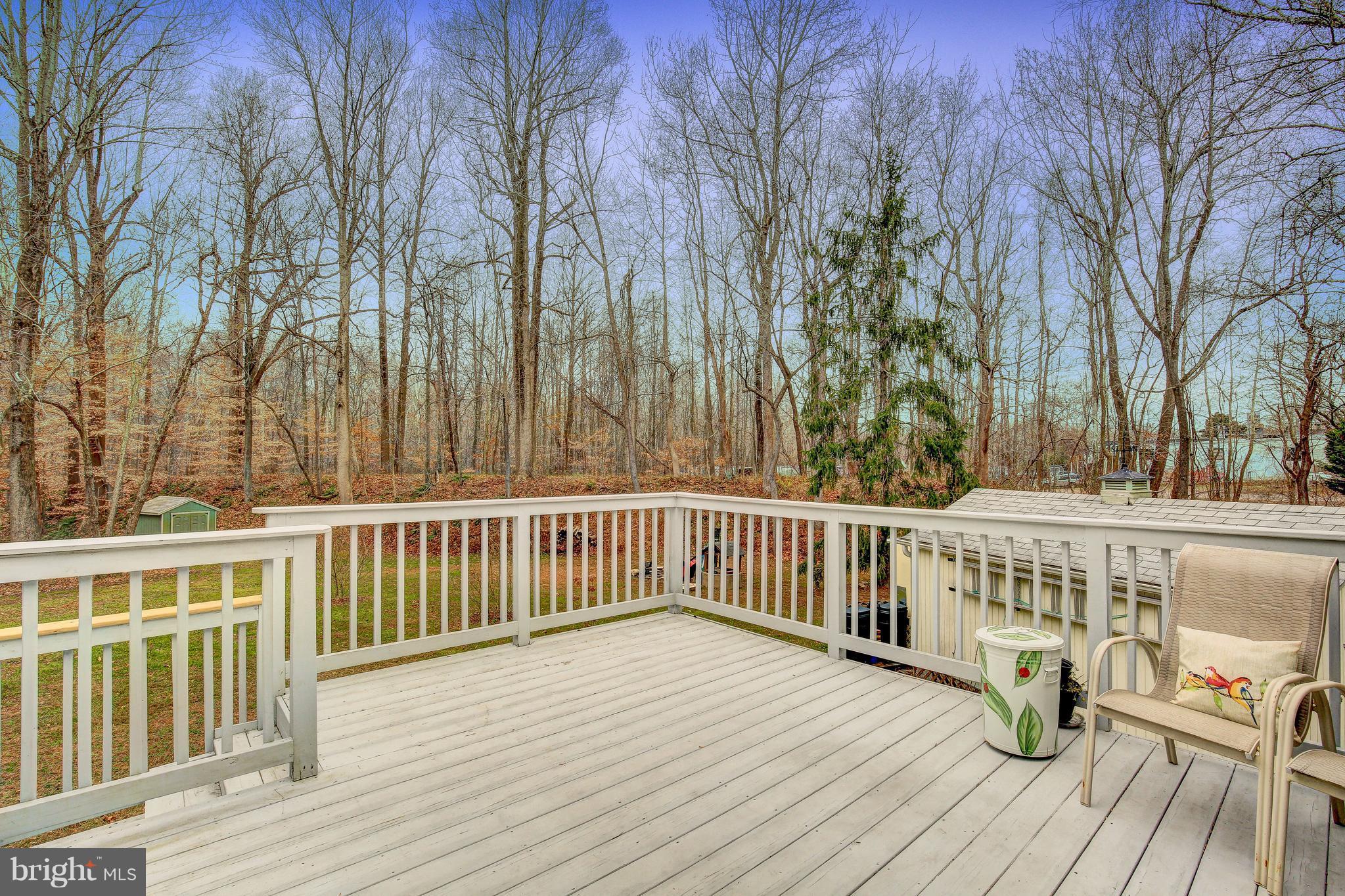 265 Chesapeake Beach Road Owings, MD 20736 - Photo 26 of 30 a view of balcony with wooden floor and fence