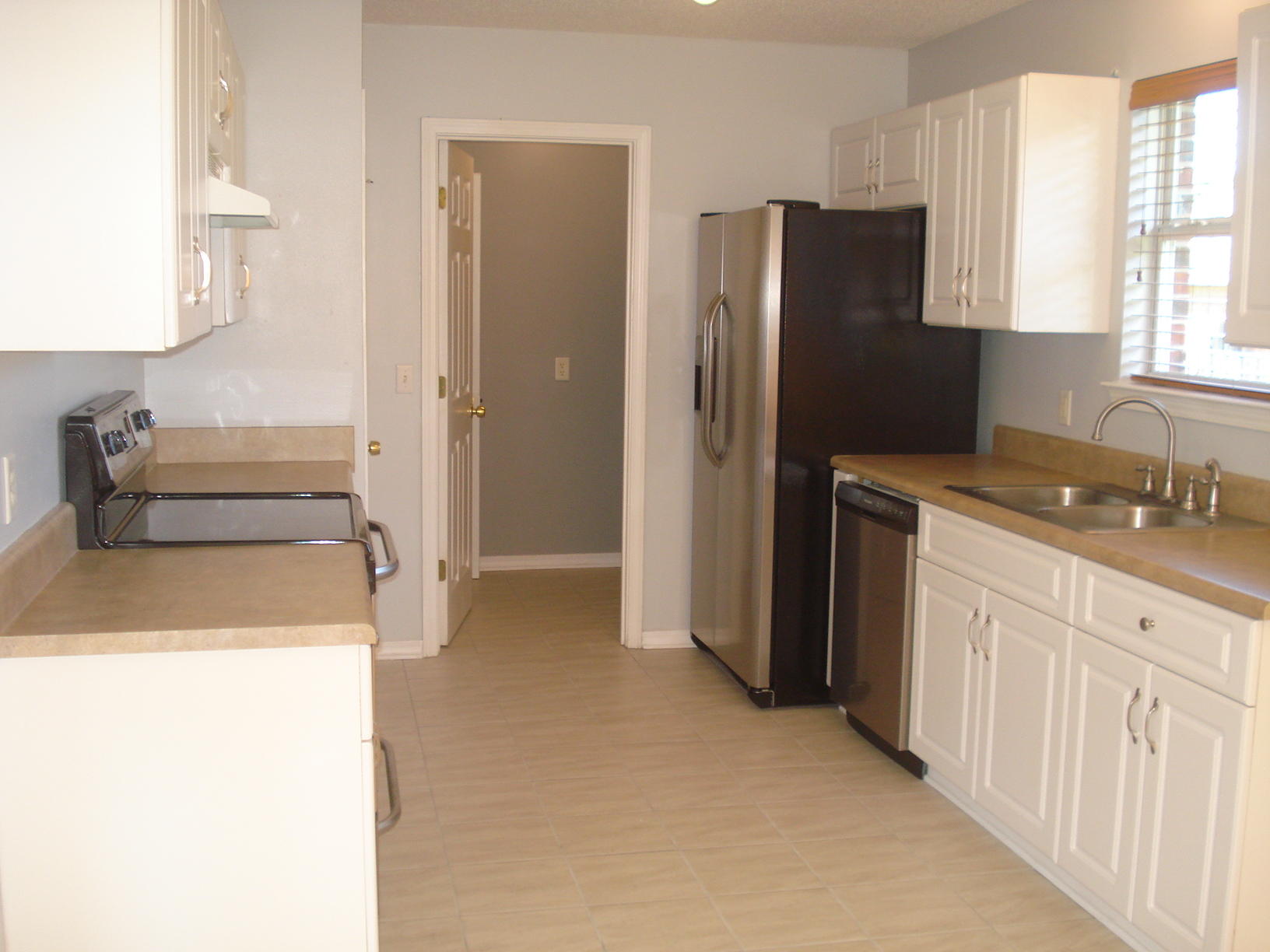 4755 Balboa Road Crestview, FL 32539 - Photo 9 of 30 Kitchen w/door into laundry