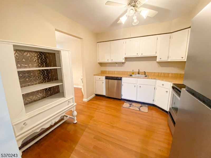 73 Farm Road Hillsborough, NJ 08844 - Photo 11 of 26 a view of a kitchen with a sink cabinets and window