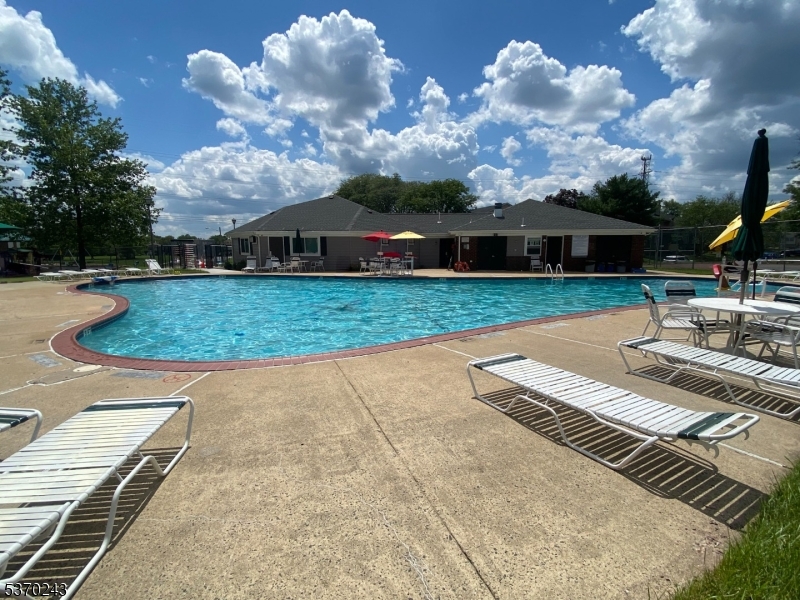73 Farm Road Hillsborough, NJ 08844 - Photo 17 of 26 a front view of a house with garden