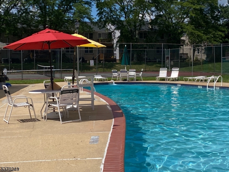 73 Farm Road Hillsborough, NJ 08844 - Photo 18 of 26 a view of a swimming pool with sitting area and furniture